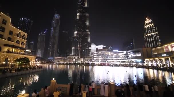 Downtown Dubai Uae Night Burj Khalifa Artificial Lake People Tilt — Video