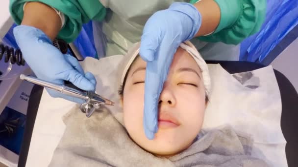 Asian Girl Getting Facial Treatment Water Oxygen Sprayer Moisturize Skin — Video