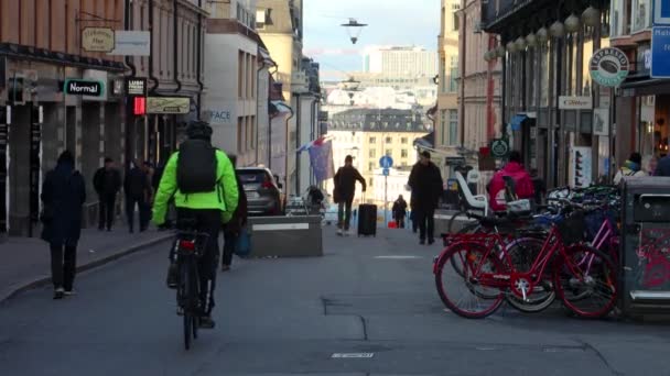 Man Rides Bike Middle Busy Pedestrian Street Stockholm Sweden — стоковое видео