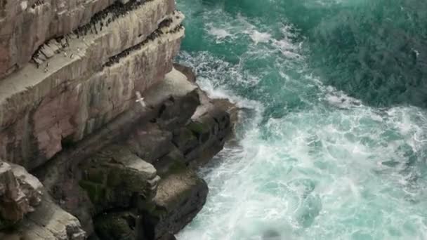 Powerful Waves Crash Rocks Sea Cliff Middle Beautiful Deep Teal — Stock video