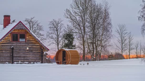 Barrel Sauna Log Cabin Snow Winter Sun Rising Background Fiery — Wideo stockowe