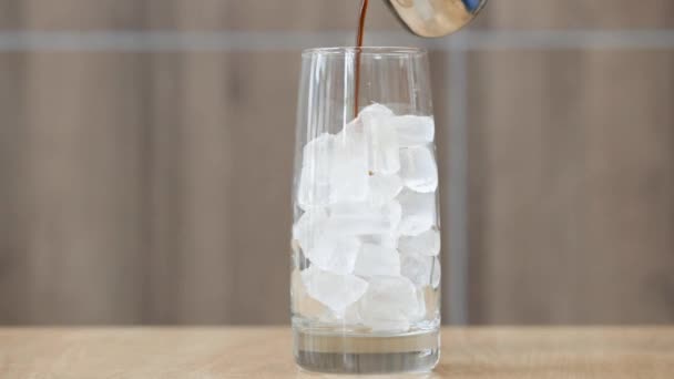 Dark Black Coffee Being Poured Ice Cubes Tall Glass Static — Vídeo de stock