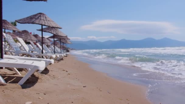 Summer Tropical Beach Scenery Straw Umbrellas While Waves Break Seashore — Wideo stockowe