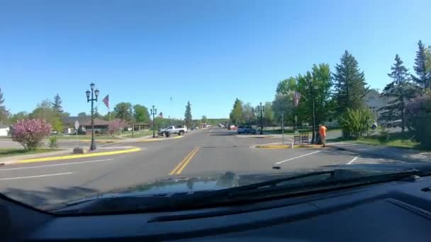 Pov While Driving Downtown Small Rural Town Northern Minnesota Sunny — Video