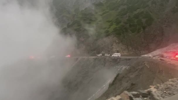 Vehicles Driving Cliffside Road Himalayas Mountain Range Foggy Day Pov — Stockvideo