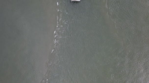 Aerial Drone Shot Long Wooden Fishing Pier People Enjoying Cloudy — Vídeos de Stock