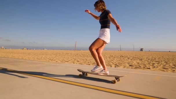 Happy Girl Turning While Skateboarding Asphalt Road Desert Park Slow — 图库视频影像