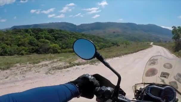 Riding Gravel Road Distant Mountains Driver Point View — Stock videók