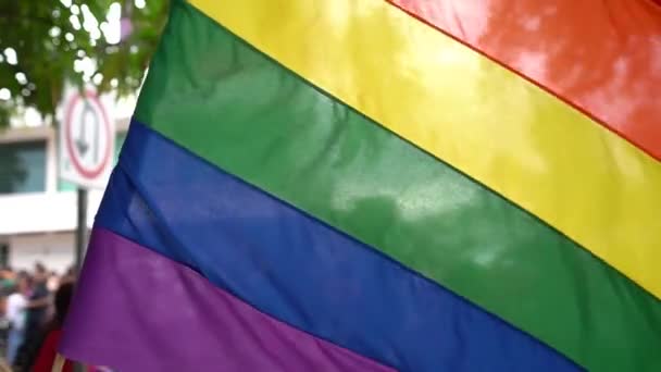 Translucent Lgbt Pride Flag Flies City Street Hundreds People — Stok Video