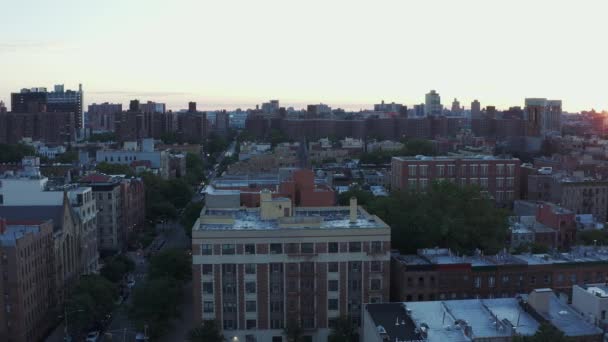 Slow Aerial Pan Rooftops Harlem Nyc Ending Sunrise Sun Flare — Stock Video
