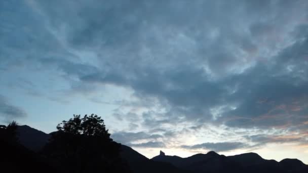 Timelapse Cloudy Sky Lighted Sun Beginning Evening Switzerland — Stockvideo