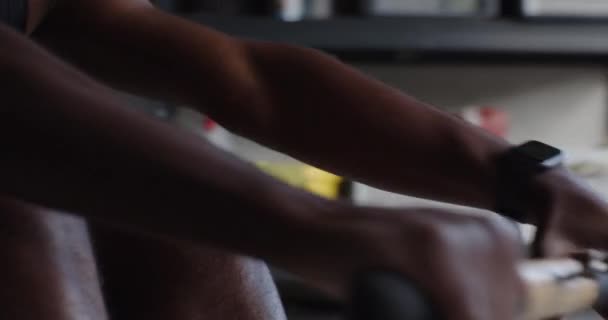 Close Hand Young Black Athlete Rowing Machine — Vídeo de Stock
