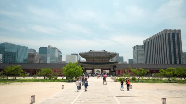 Travelers Passing Heungnyemun Gate Crossing Yeongjegyo Bridge Gyeongbokgung Palace View — Video