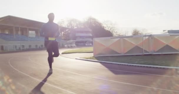 Young Black Athlete Running Track Sunset Background — Stock videók