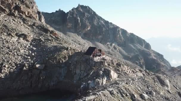 Tilt Drone View Wooden Cabane Swiss Alps Rocky Mountains — Stockvideo