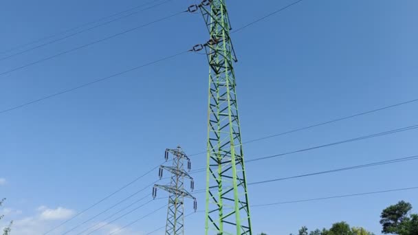 Electric Lines Two High Pylons Transferring Electricity — Stock video