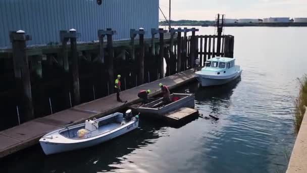 Men Attempting Lift Large Piece Metal Salvage Boat — Stockvideo