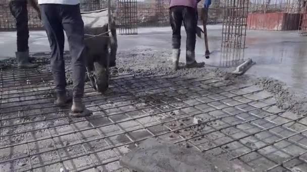 Construction Worker Concrete Slab Being Cast Wheelbarrow Concrete Trolley Construction — Stock video