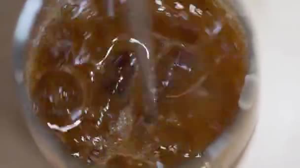 Overhead View Vietnamese Iced Coffee Being Stirred — Vídeo de stock
