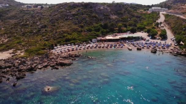 Wide Aerial View Anthony Quinn Bay Its Azure Blue Waters — Stock video