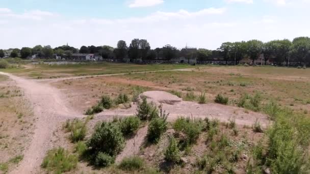 Drone Shot Undeveloped Vacant Lot Edge Dutch City Skyline Background — Stock video