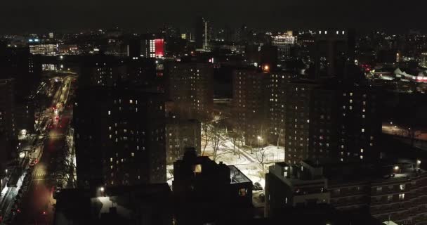 Nighttime Winter Orbit Housing Project Buildings Snow Ground — Stockvideo