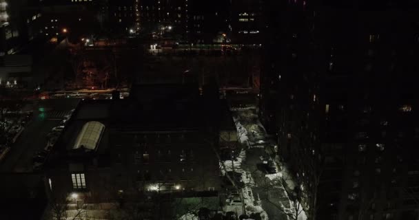 Nighttime Winter Reverse Aerial Flight Backs Away Highrises Harlem Nyc — Stockvideo