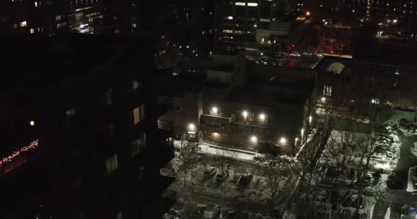 Nighttime Winter Reverse Diagonal Flyover Next Highrise Building Harlem Nyc — Stockvideo