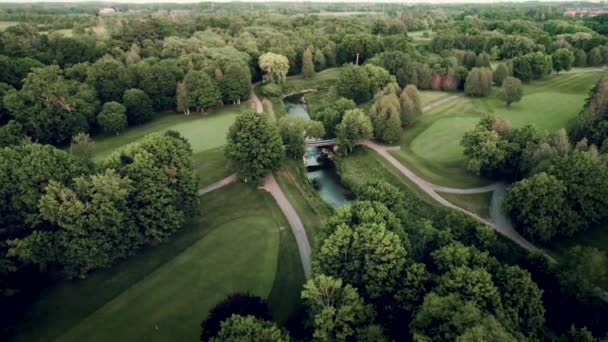 Aerial View Lush Scenic Golf Course River Bridge Drone Fly — Stockvideo