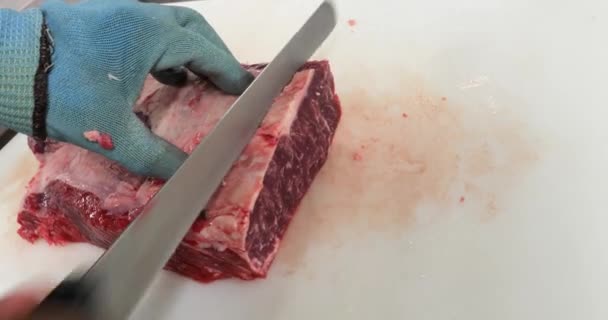 Chef Portioning New York Strip Steak — Video