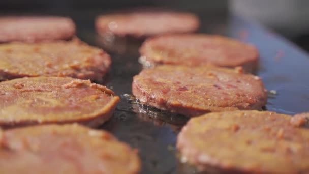 Dynamic Footage Sizzling Veggie Burger Patties Being Cooked Table Top — Video Stock