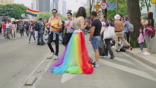 Women Wearing Rainbow Dress Standing Road Talking Mobile Pride Parade — Vídeos de Stock