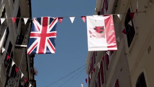 Flags Great Britain Gibraltar Hanging Rope Houses — Stok video
