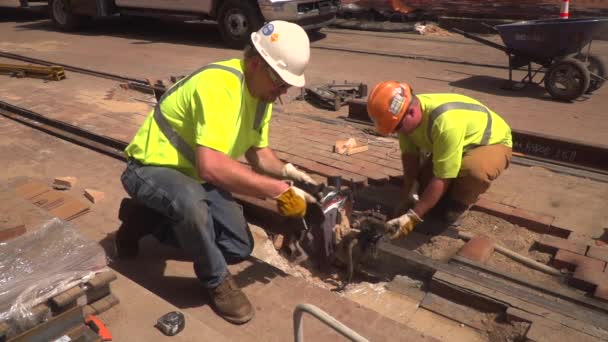 Slow Motion Video Construction Workers Finishing Welding New Railroad Tracks — Video