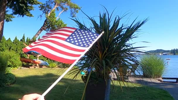 American Flag Stars Stripes Flies Wind Garden Beach Slow Motion — Stock Video