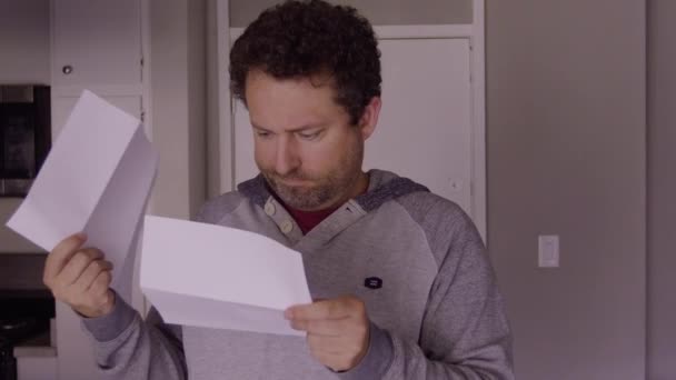 Close Shot Young Man Reading Something Postal Mail Letter Paper — Vídeo de Stock