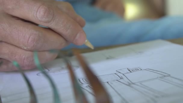 Hand Drawing Pencil Paper Wooden Table — Vídeos de Stock