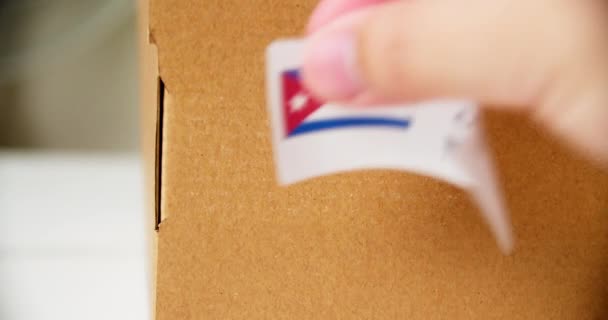 Hands Applying Made Cuba Flag Label Shipping Cardboard Box Products — Vídeos de Stock