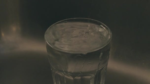 Water Falls Glass Slow Motion Half Glass — Stock Video