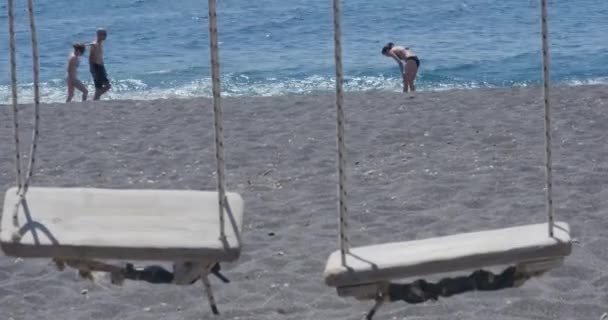 People Playing Ocean Swings Beach Santorini Island Greece — Stockvideo