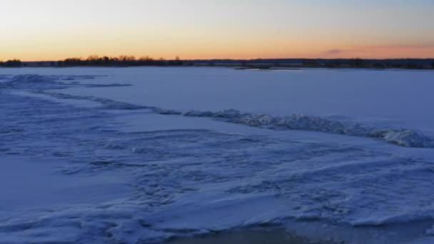 Aerial View Flying Snowy Winter Landscape Sunrise — Stockvideo