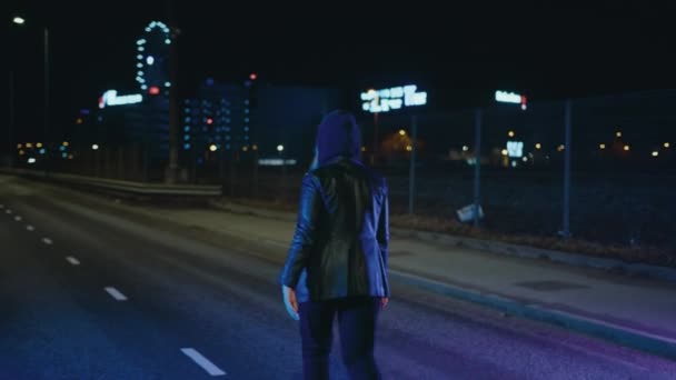 Hooded Woman Walks Middle Empty Street Night — Vídeos de Stock