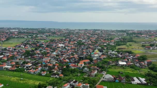 Aerial Skyline Balinese Orange Rooftop Homes Bali Island Coastline — Video Stock