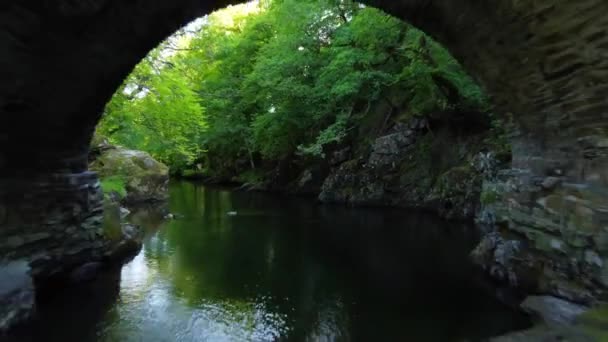 Wales Fairy Tale Bridge Drone Pullback Reveal River Stream Rocks — стокове відео