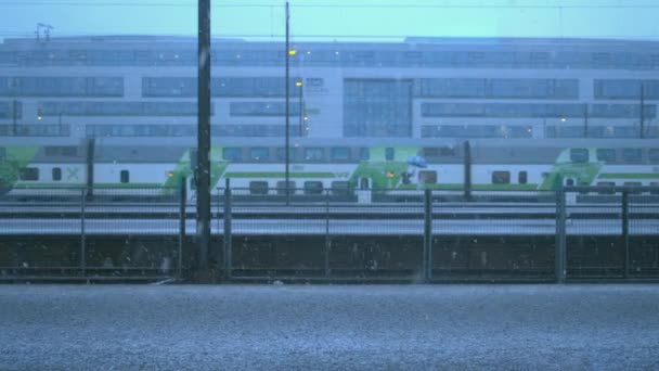 Modern Train Rolls Slowly Station Platform Snowy Winter Day — Stock Video