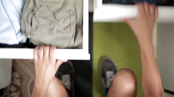 Top View Close Shot Person Takes Clothes Two Drawers — Vídeo de Stock