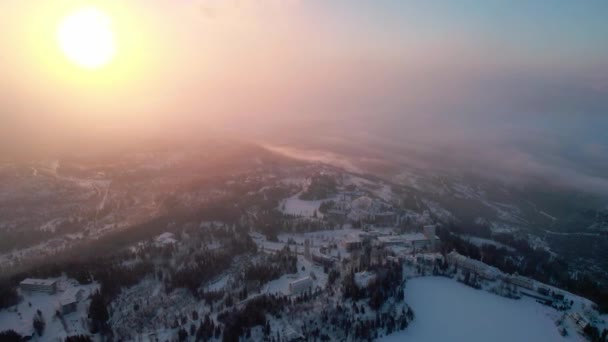 Bright Sun Shining Snowy Landscape Winter Aerial Drone Pan Right — ストック動画