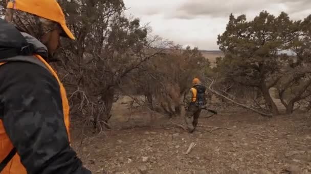 Two Deer Hunters Dressed Full Warm Hunting Apparel Carry Rifles — Stock video