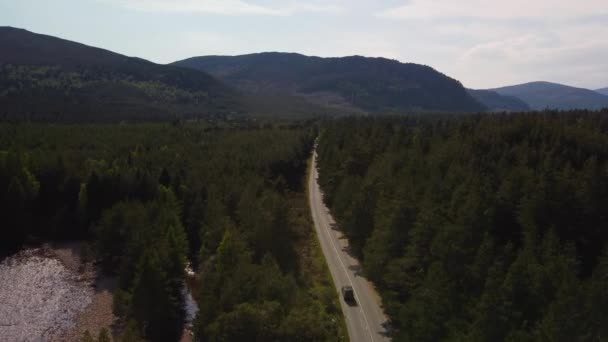Drone Pushin Shot Scotland Hills Car Driving Distance Road — Stockvideo