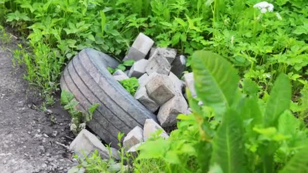 Discarded Roader Tyre Interlock Bricks — Video Stock